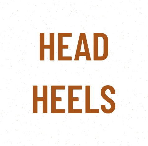 Rebus: the word HEAD stacked over the word HEELS